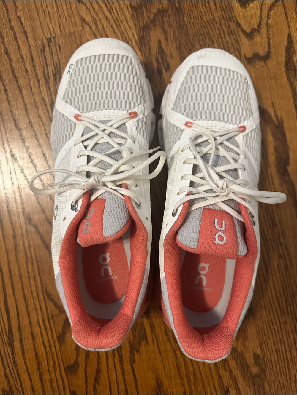 On Running Women’s White and Coral Lace-Up Sneakers